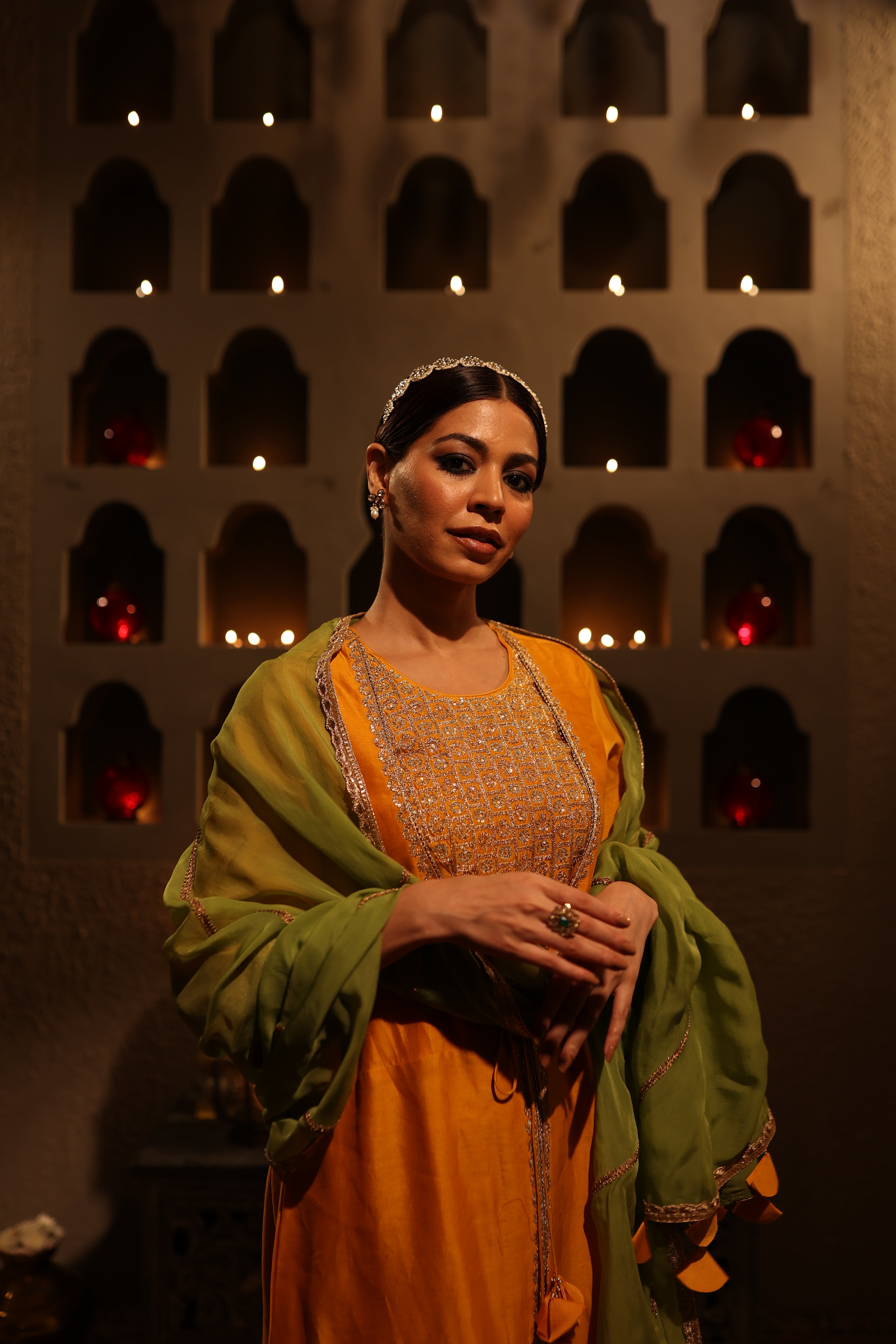 Model wearing mustard yellow Chanderi suit with aari tari embroidery – Moseequi collection, House of AAS