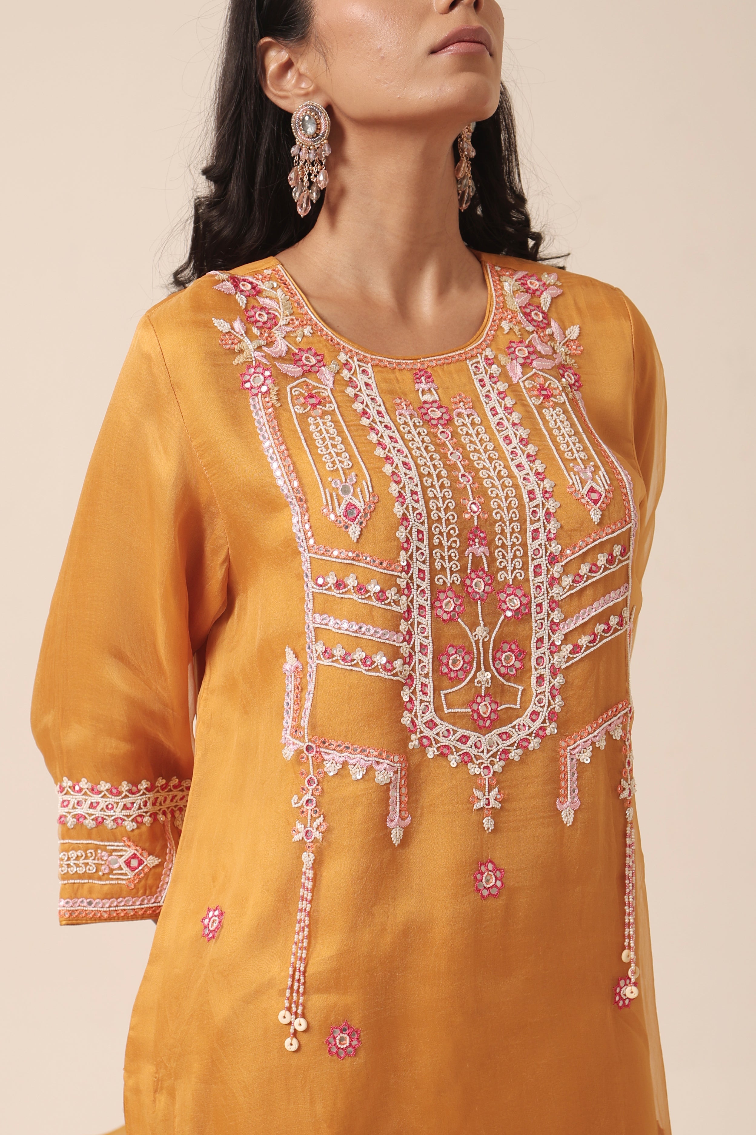 Mustard organza kurta close-up with intricate mirror embroidery – Jhilmil Collection