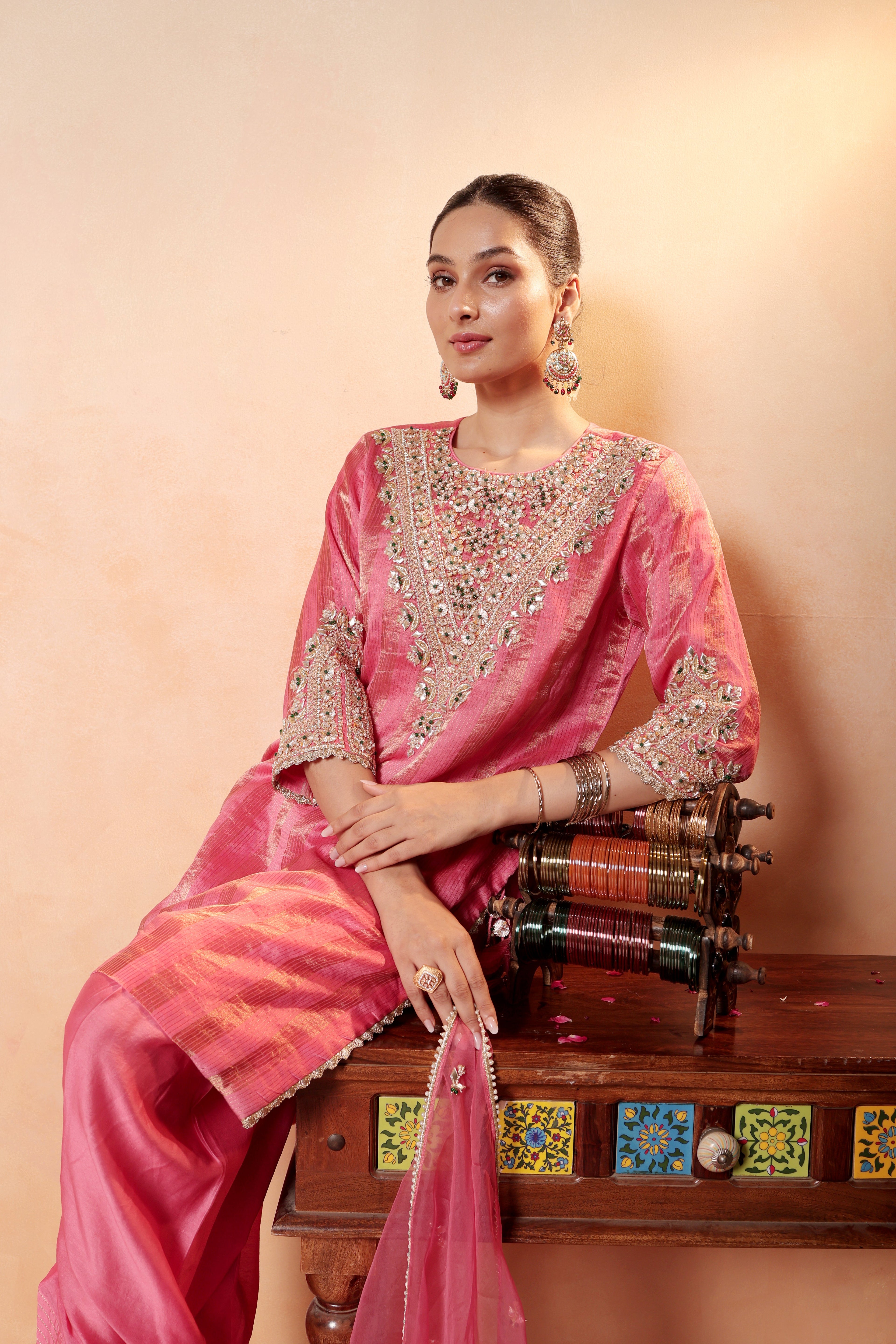 Model wearing pink silk striper tissue kurta with gota embroidery, paired with traditional farshi salwar and dupatta – Sunehri Gota Collection by House of AAS.