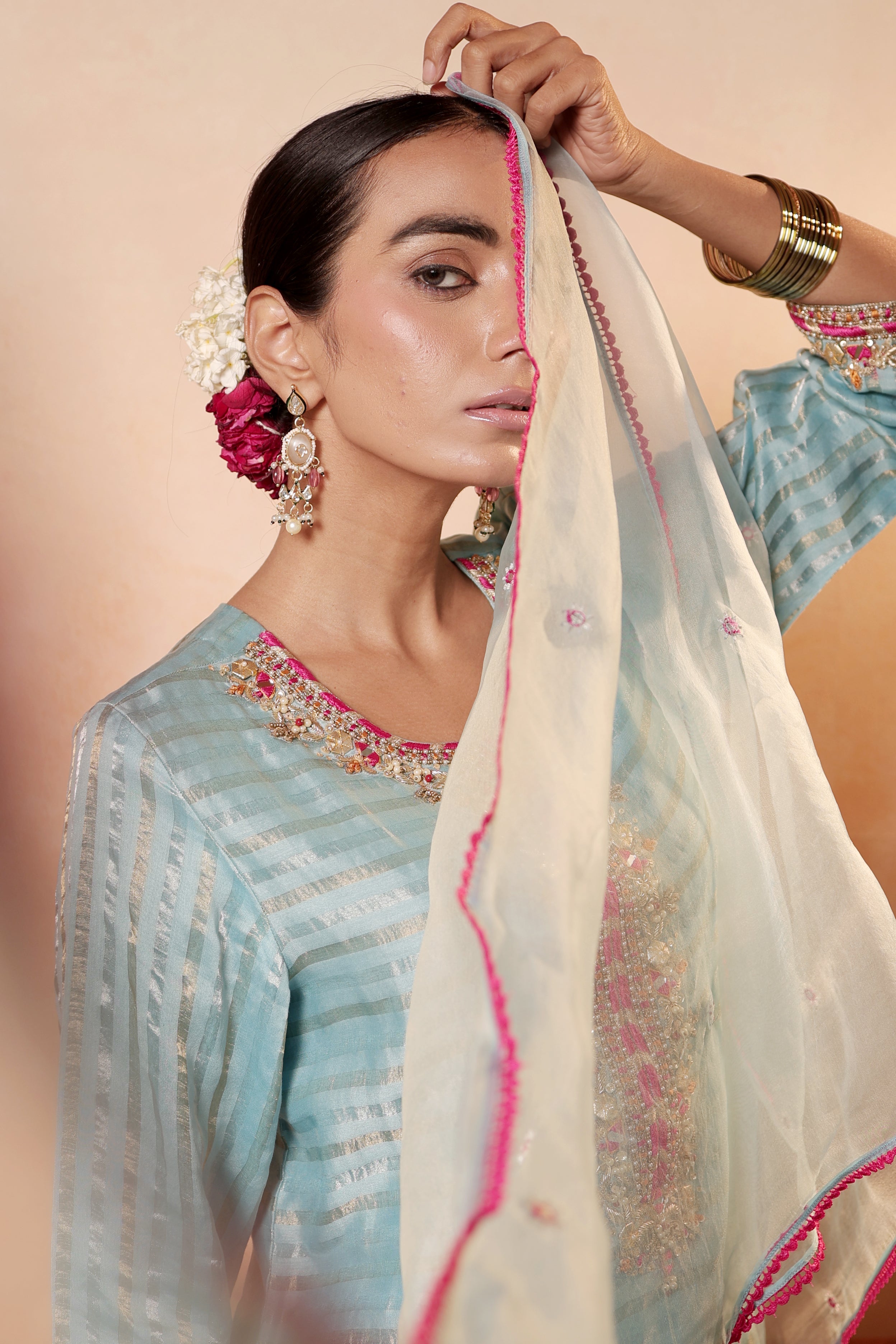 Model wearing sky blue silk striper tissue kurta with gota embroidery, styled with traditional farshi salwar and dupatta – Sunehri Gota Collection by House of AAS.