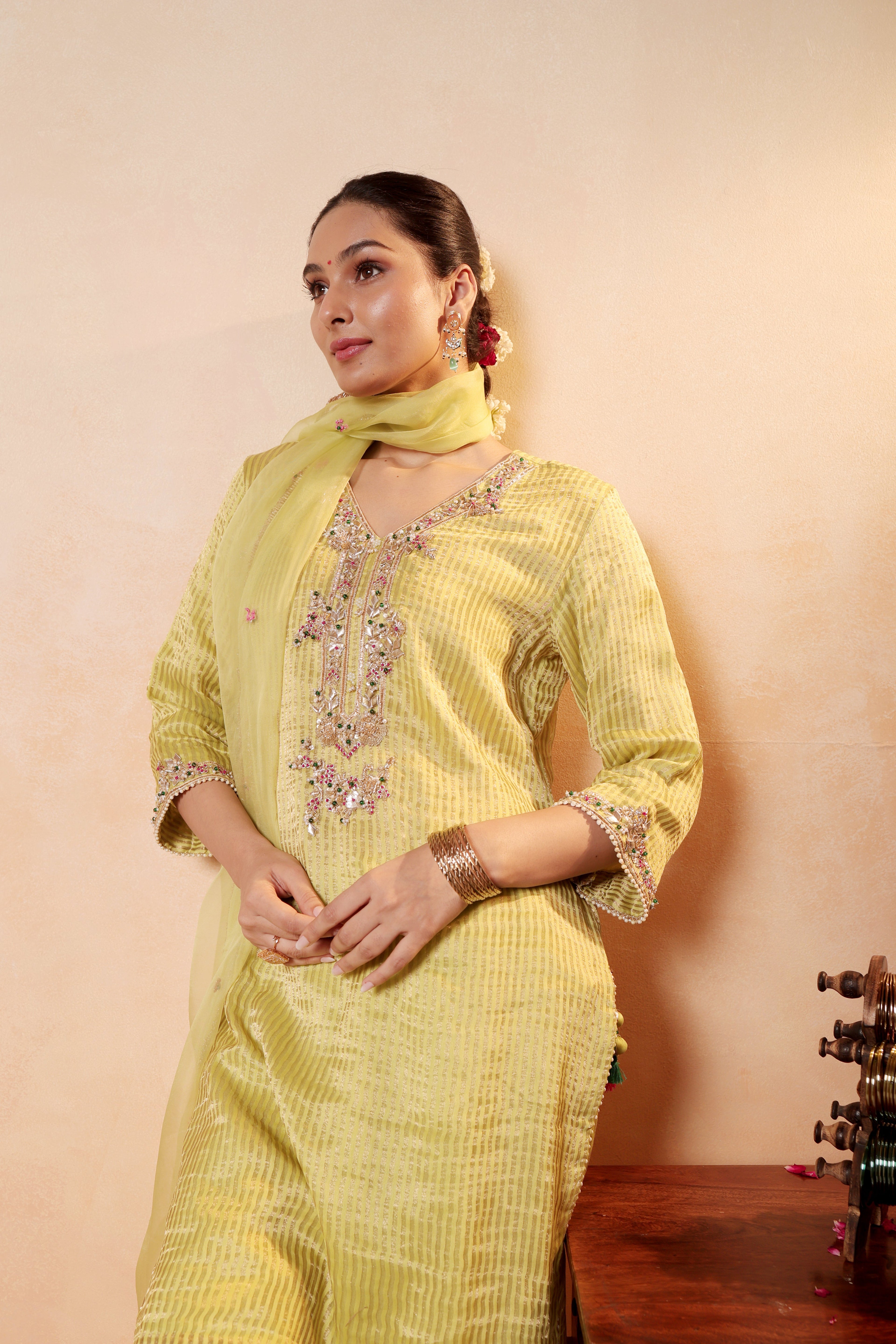 Model wearing lime yellow silk striper tissue kurta with gota embroidery, styled with traditional farshi salwar and dupatta – Sunehri Gota Collection by House of AAS.