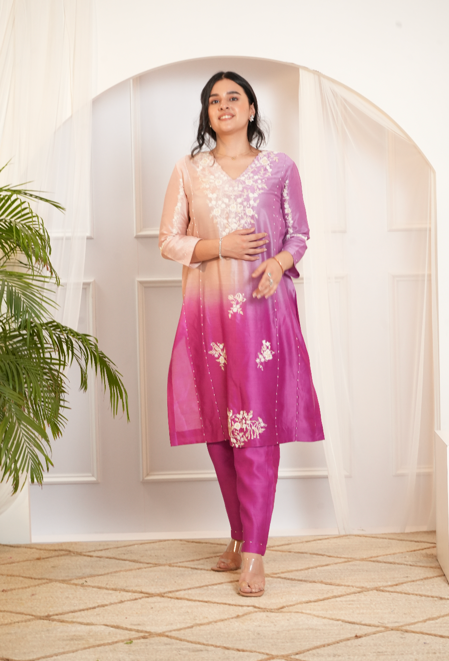 Model wearing a pink & peach ombre silk chanderi kurta set with off-white dori and bead embroidery — festive ethnic outfit.