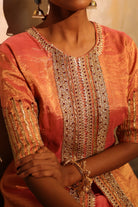 Elegant coral pink silk tissue embroidered kurta jacket set for weddings and celebrations.