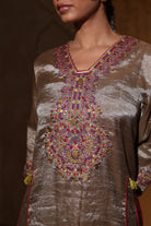 Close-up of hand-embroidered antique silver kurta in tissue fabric