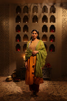 Model wearing mustard yellow Chanderi suit with aari tari embroidery – Moseequi collection, House of AAS