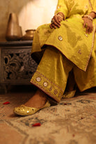 Handcrafted lime green bottom of a kurta set in silk tissue with intricate embroidery, festive wear for celebrations.