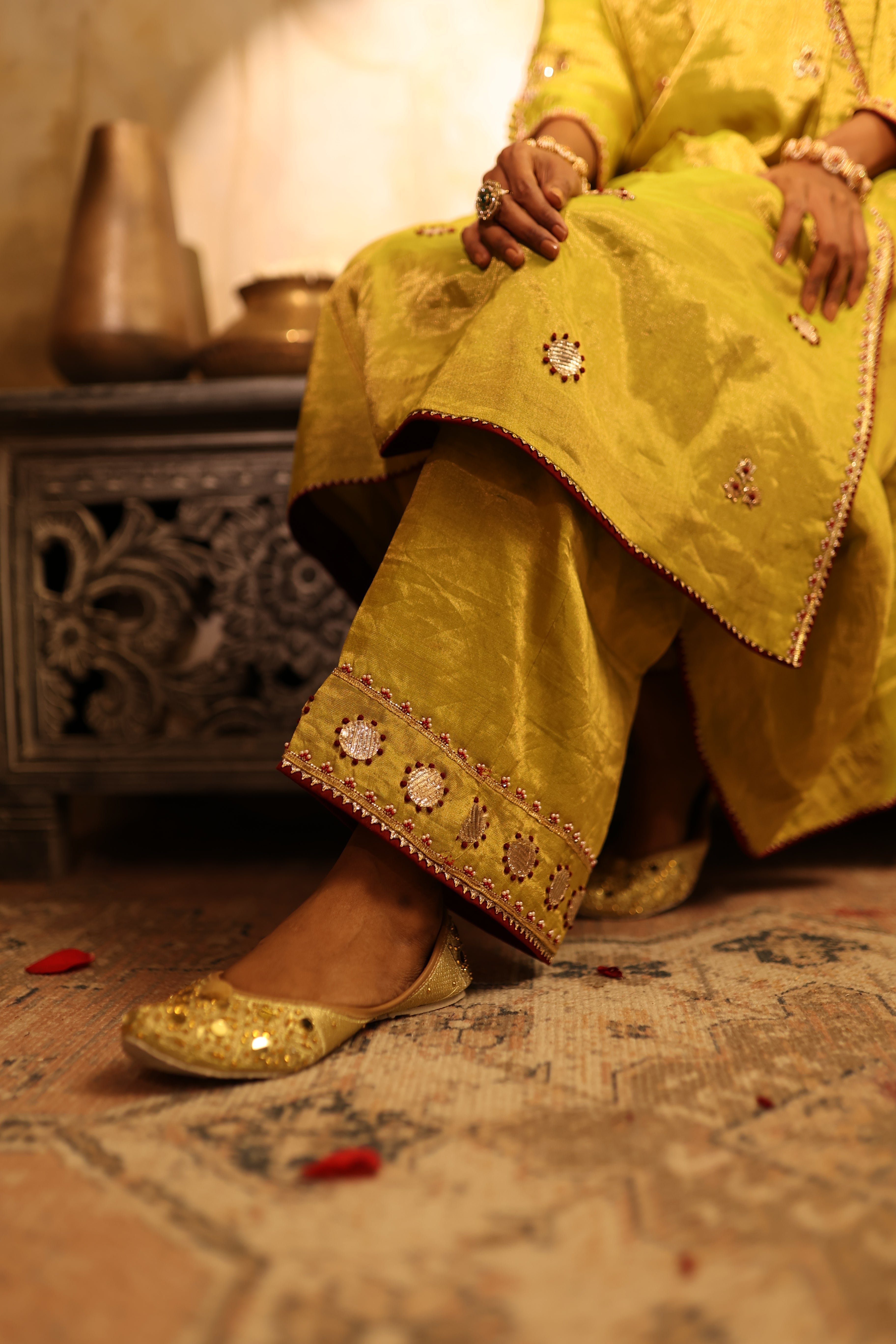 Handcrafted lime green bottom of a kurta set in silk tissue with intricate embroidery, festive wear for celebrations.