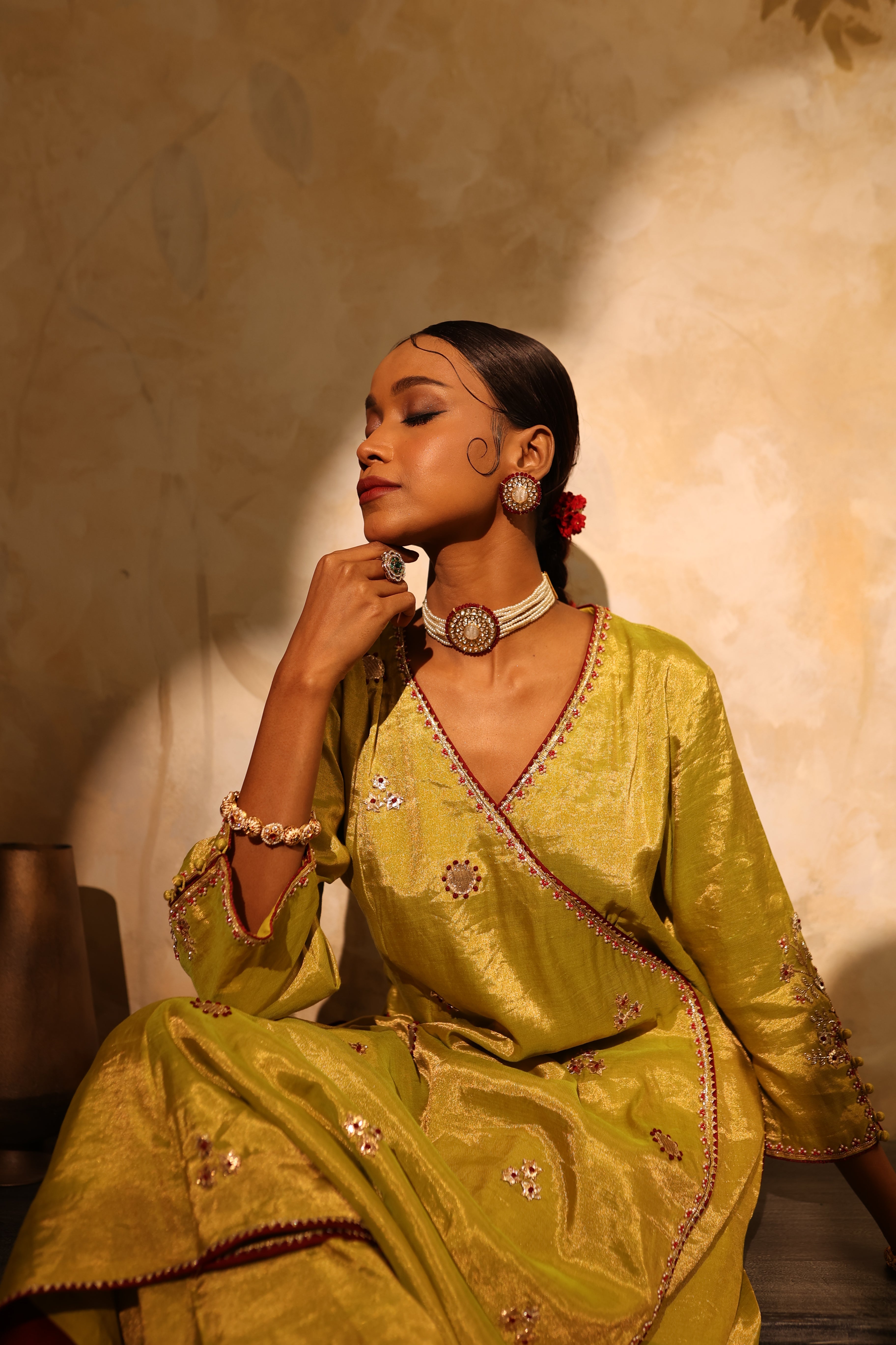 Elegant silk tissue kurta set in lime green with resham work, paired with matching pants & dupatta.