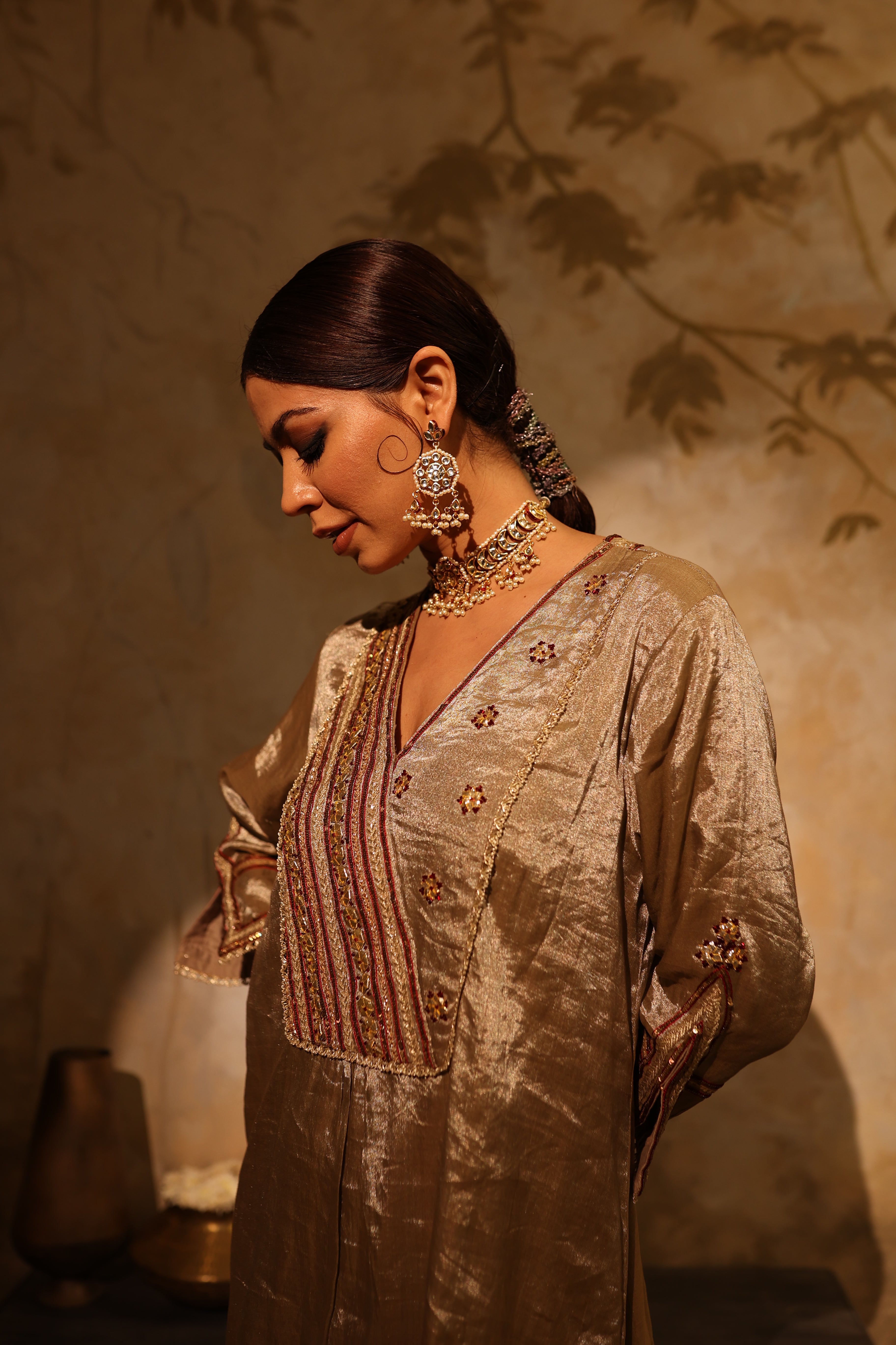 Antique silver silk tissue kurta set with intricate gota, sequin, dabka and resham embroidery, paired with dupatta – timeless festive outfit.