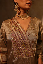Antique silver silk tissue kurta set with intricate gota, sequin, dabka and resham embroidery, paired with dupatta – timeless festive outfit.