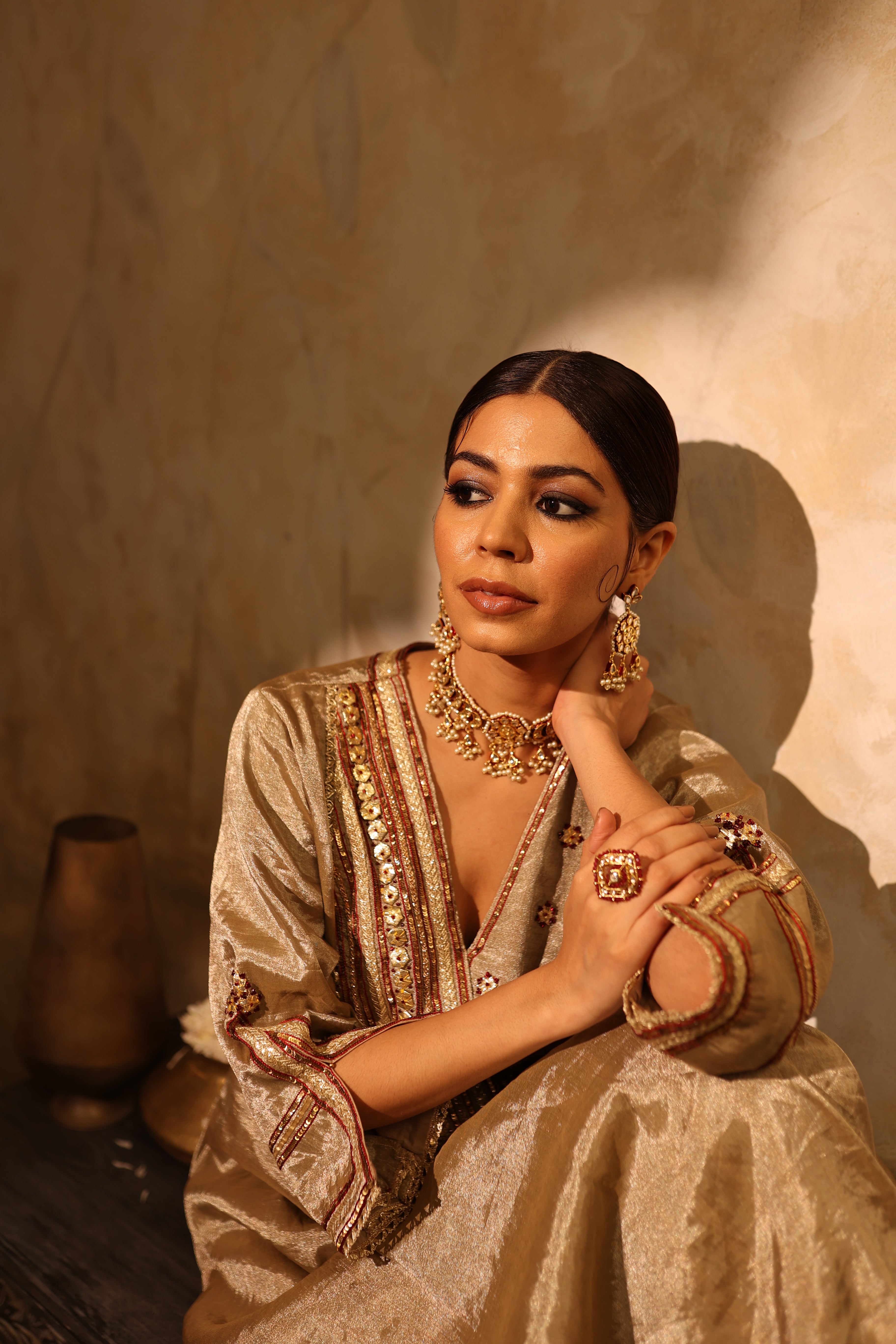 Antique silver silk tissue kurta set with intricate gota, sequin, dabka and resham embroidery, paired with dupatta – timeless festive outfit.