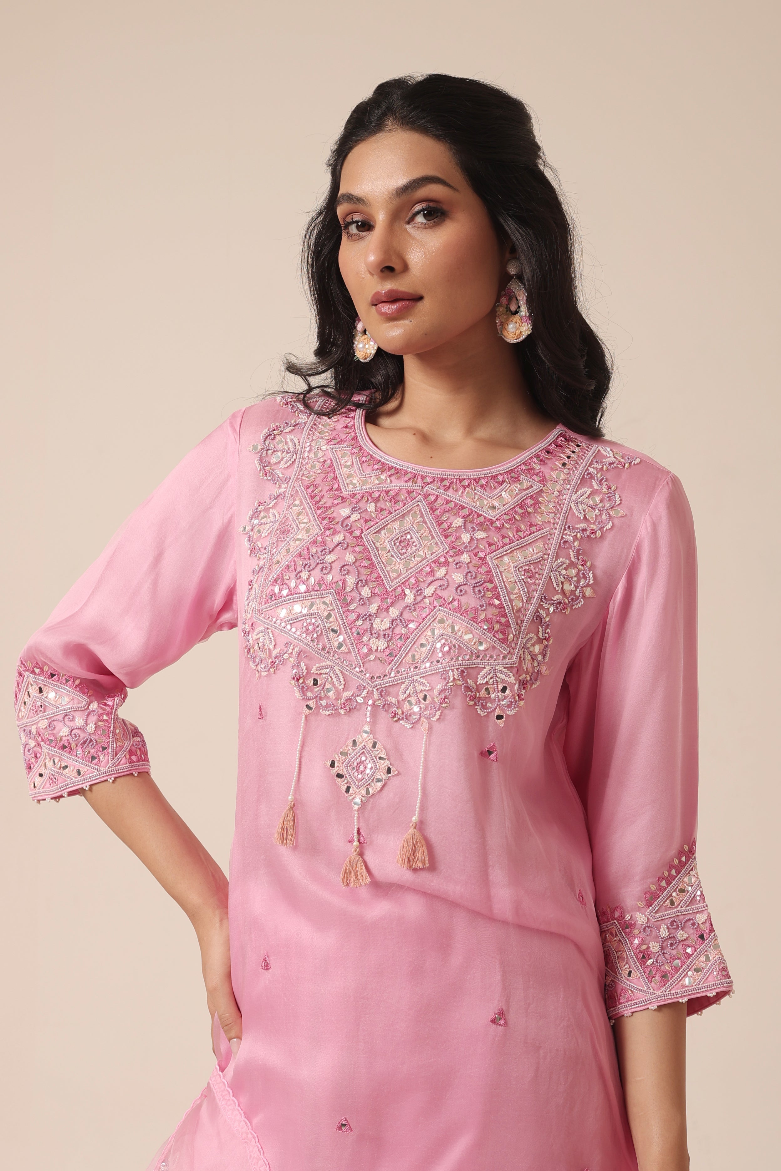 Elegant pink kurta set with farshi salwar and dupatta in silk organza – House of AAS. Close-up of mirror embroidery on pink organza kurta