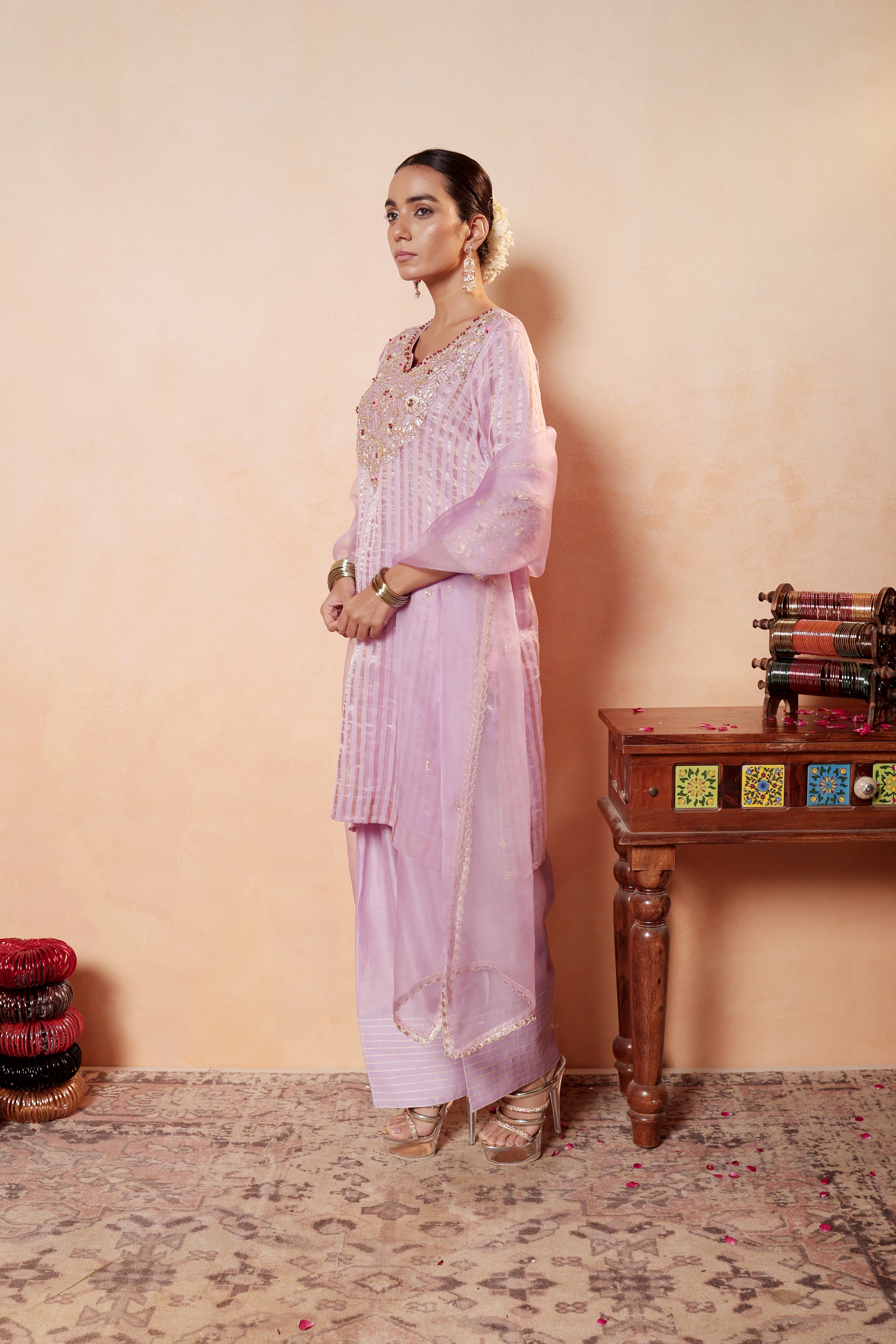 Model wearing lavender tissue silk kurta with intricate gota embroidery, paired with regal farshi salwar and dupatta – Sunehri Gota Collection by House of AAS.