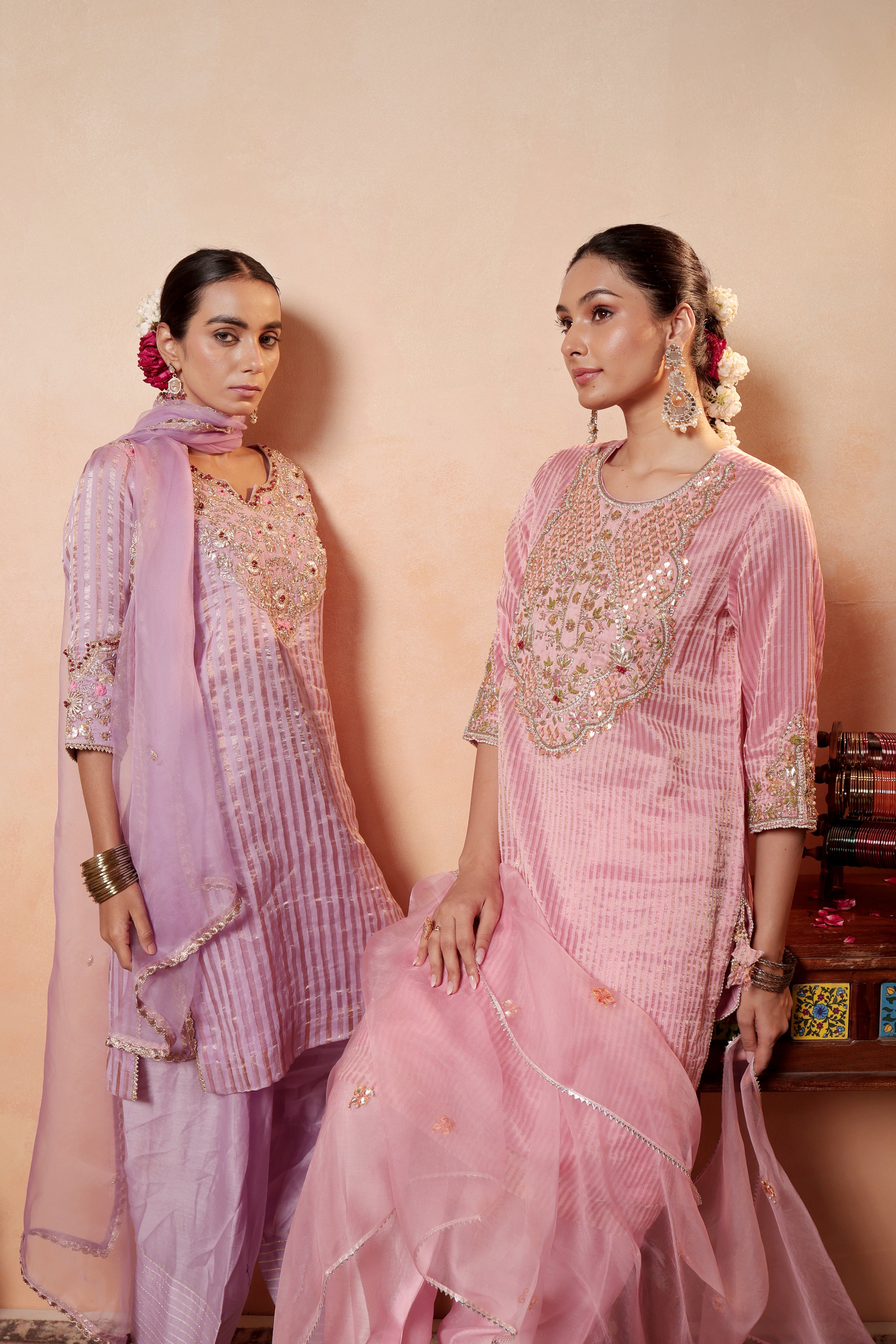 Model wearing lavender tissue silk kurta with intricate gota embroidery, paired with regal farshi salwar and dupatta – Sunehri Gota Collection by House of AAS.