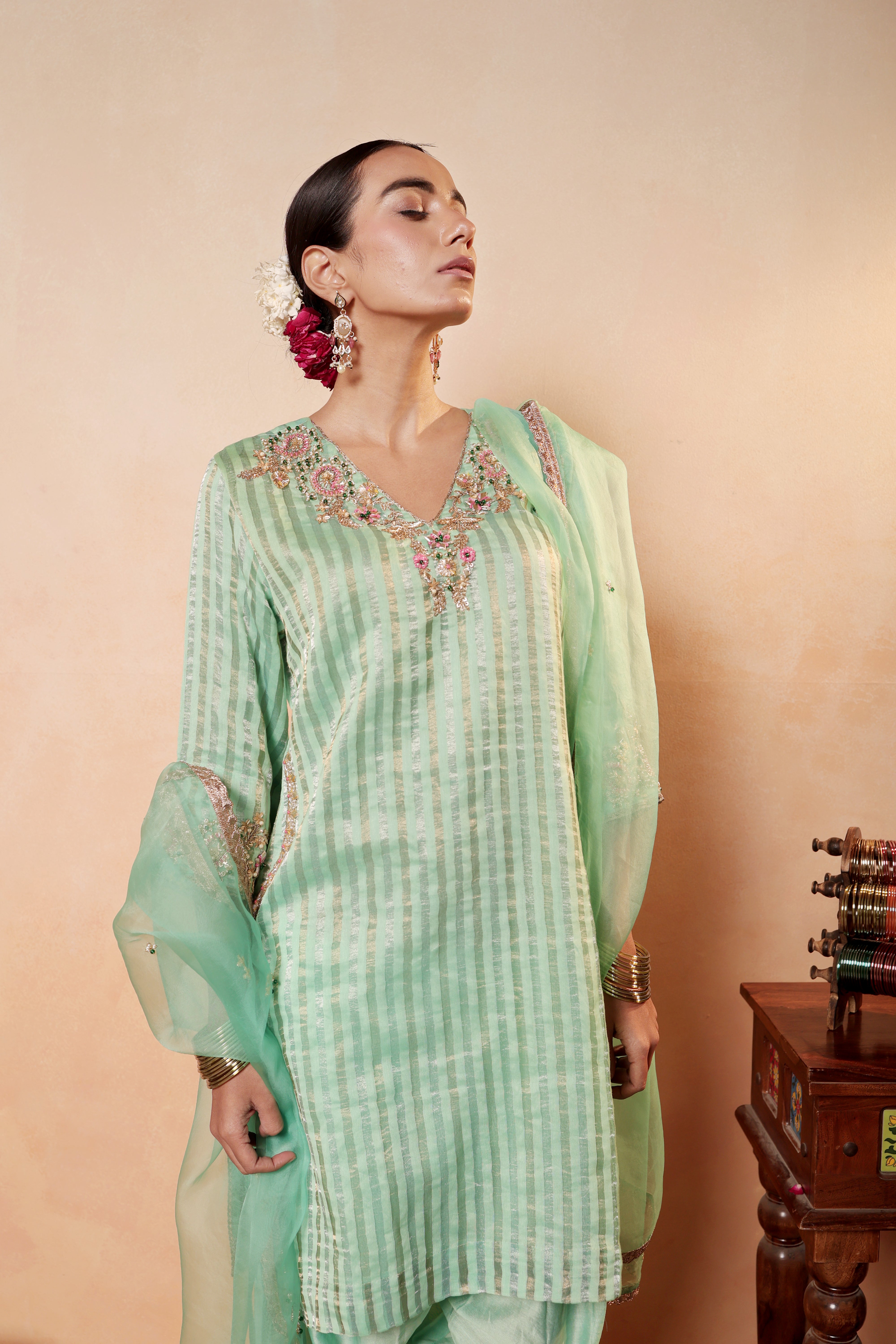 Model wearing mint green silk striper tissue kurta with intricate gota embroidery, paired with regal farshi salwar and dupatta – Sunehri Gota Collection by House of AAS.