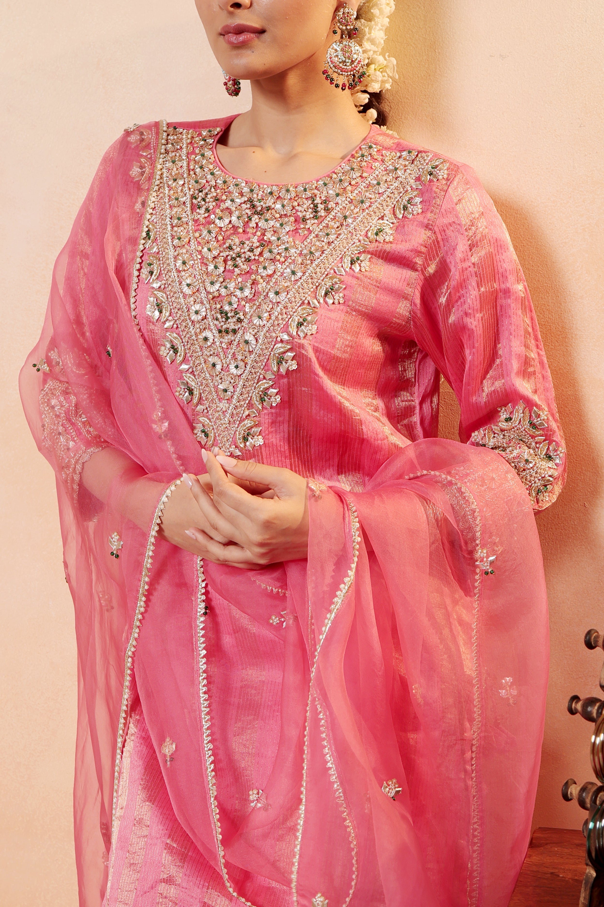 Model wearing pink silk striper tissue kurta with gota embroidery, paired with traditional farshi salwar and dupatta – Sunehri Gota Collection by House of AAS.