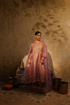 Mauve silk tissue kurta set with hand embroidery and organza dupatta, perfect festive wear.
