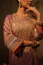 Mauve silk tissue kurta set with hand embroidery and organza dupatta, perfect festive wear.