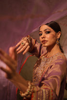 Mauve silk tissue kurta set with hand embroidery and organza dupatta, perfect festive wear.