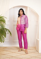 Model wearing a peach & pink ombre silk chanderi 3/4 balloon sleeve co-ord set with off-white dori and bead embroidery — festive & wedding outfit.